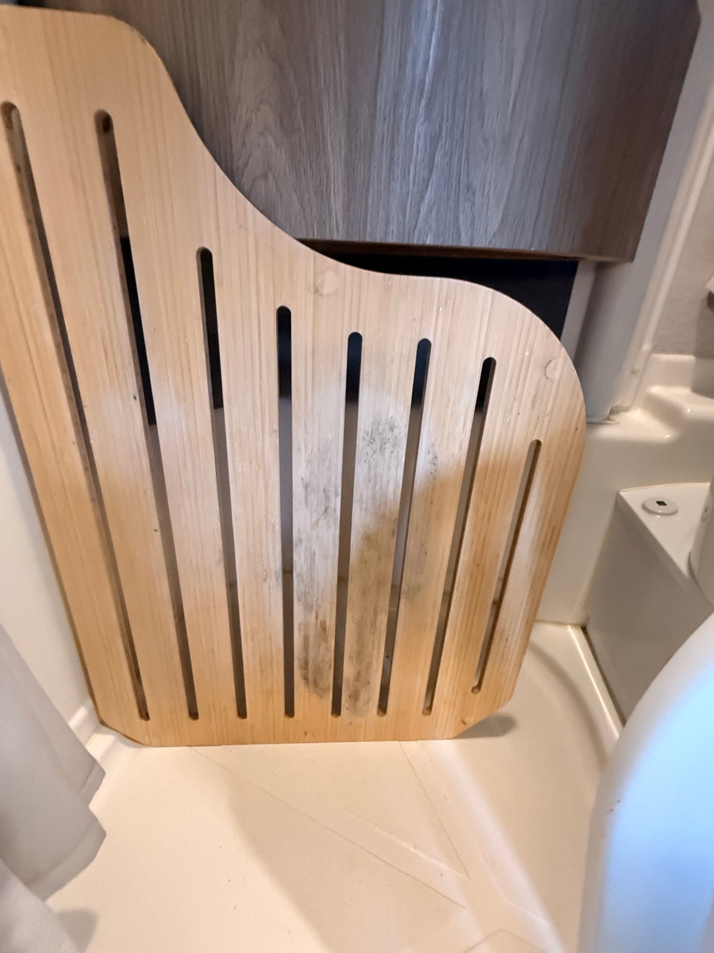 Old wooden shower insert creating mold.